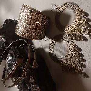 Cuff bracelet & earrings with a arm wrap bracelet. High on the four arm.